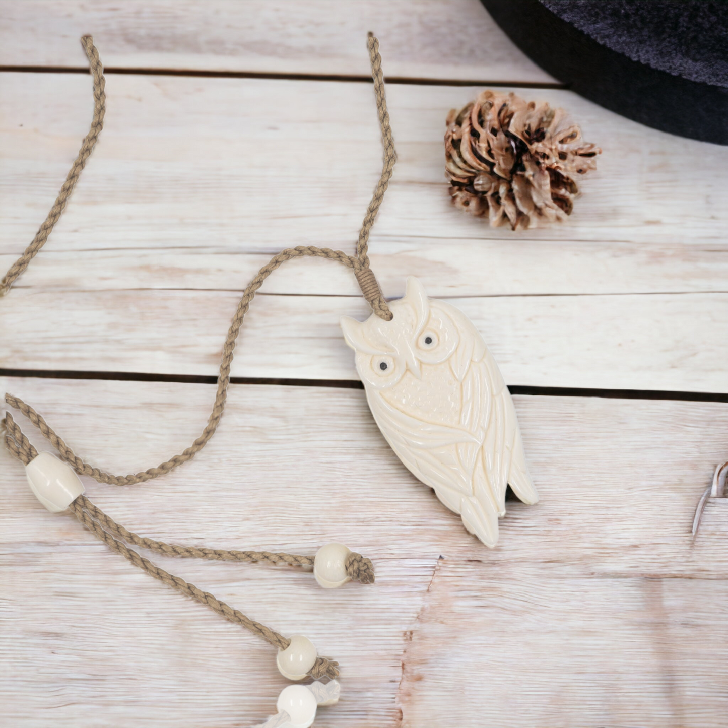 bone-carving-pendant-owl-ks