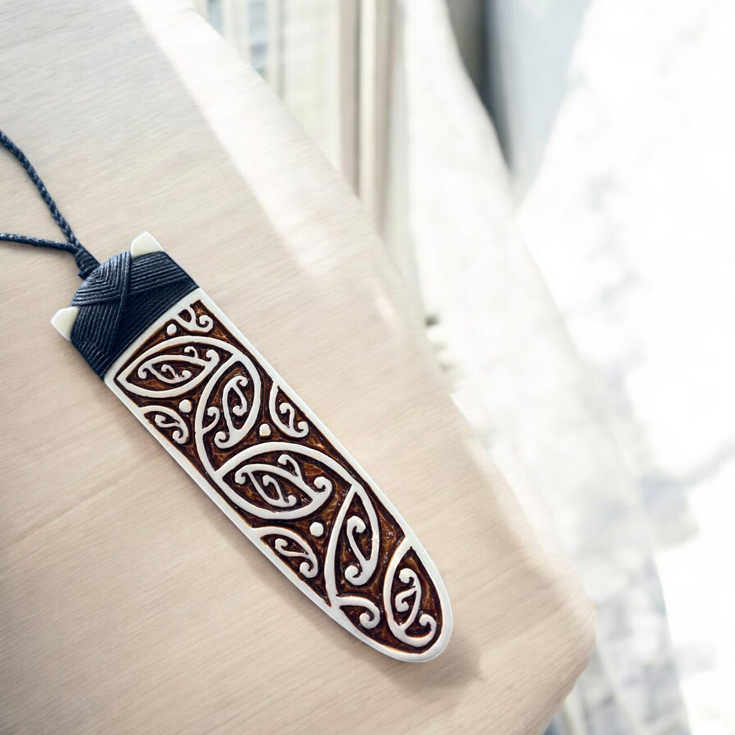 NZ Bone Toki Pendant (Kowhaiwhai Design Stained)